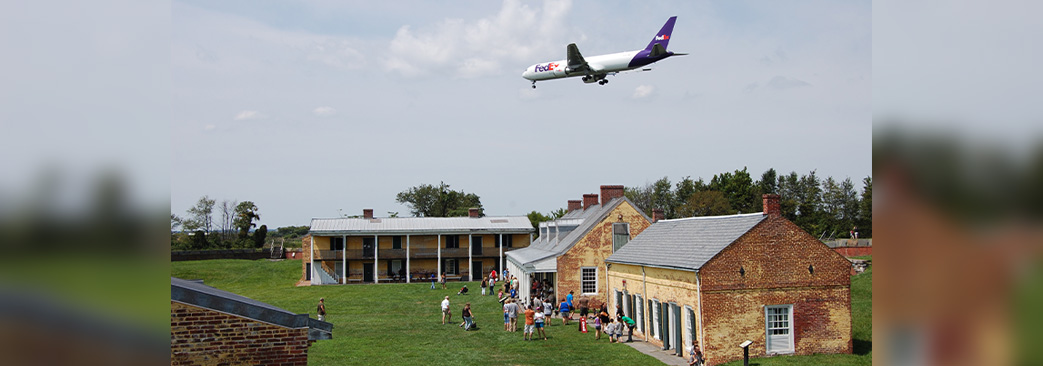 Fedex plane flying closely over fort mifflin